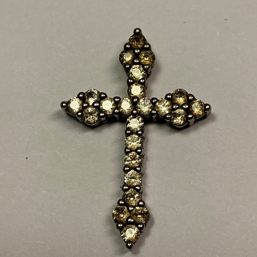 Sterling Silver Cross with clear stones. Signed SUN. 1 inch long